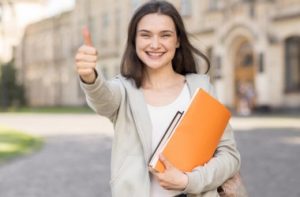 1-portrait-of-young-student-happy-to-be-back-at-university_23-2148586559_i
